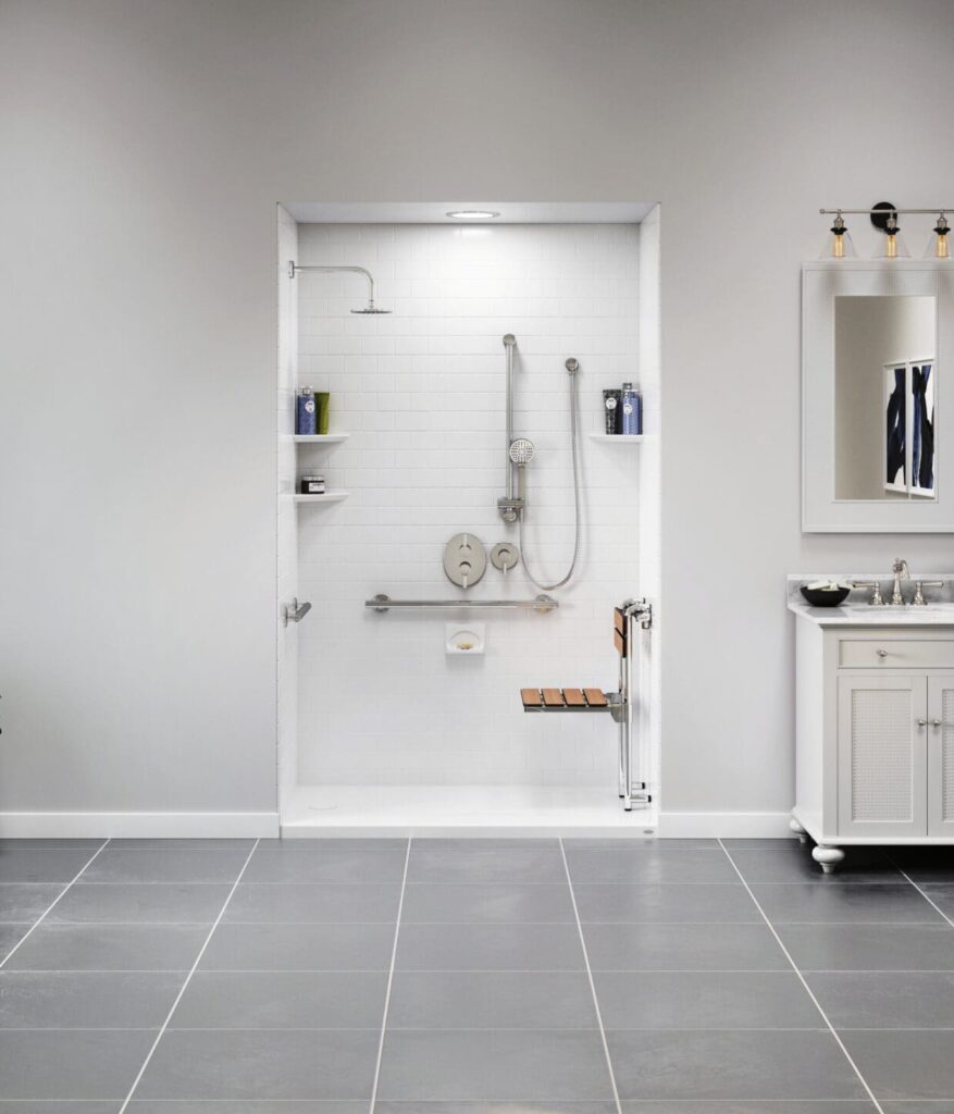 shower with grab bars and hanging seat in white bathroom