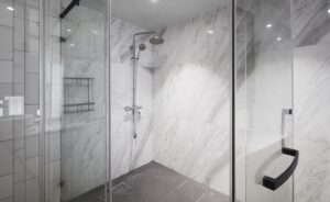 Barrier-free shower with a sloped floor and linear drain