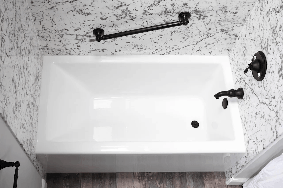 Modern bathroom with wall panel surround and shower fixtures